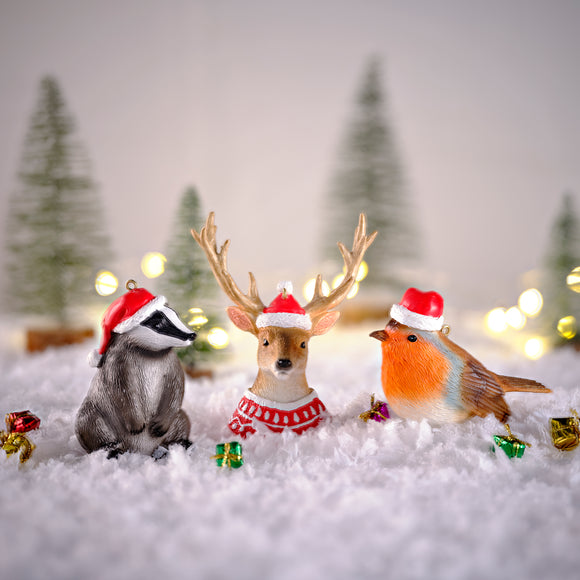 Buddy and Bailey Woodland Animal themed christmas tree decorations including a badger christmas decoration, a stag in a christmas jumper decoration and a robin christmas decoration all suitable to hang on a Christmas tree